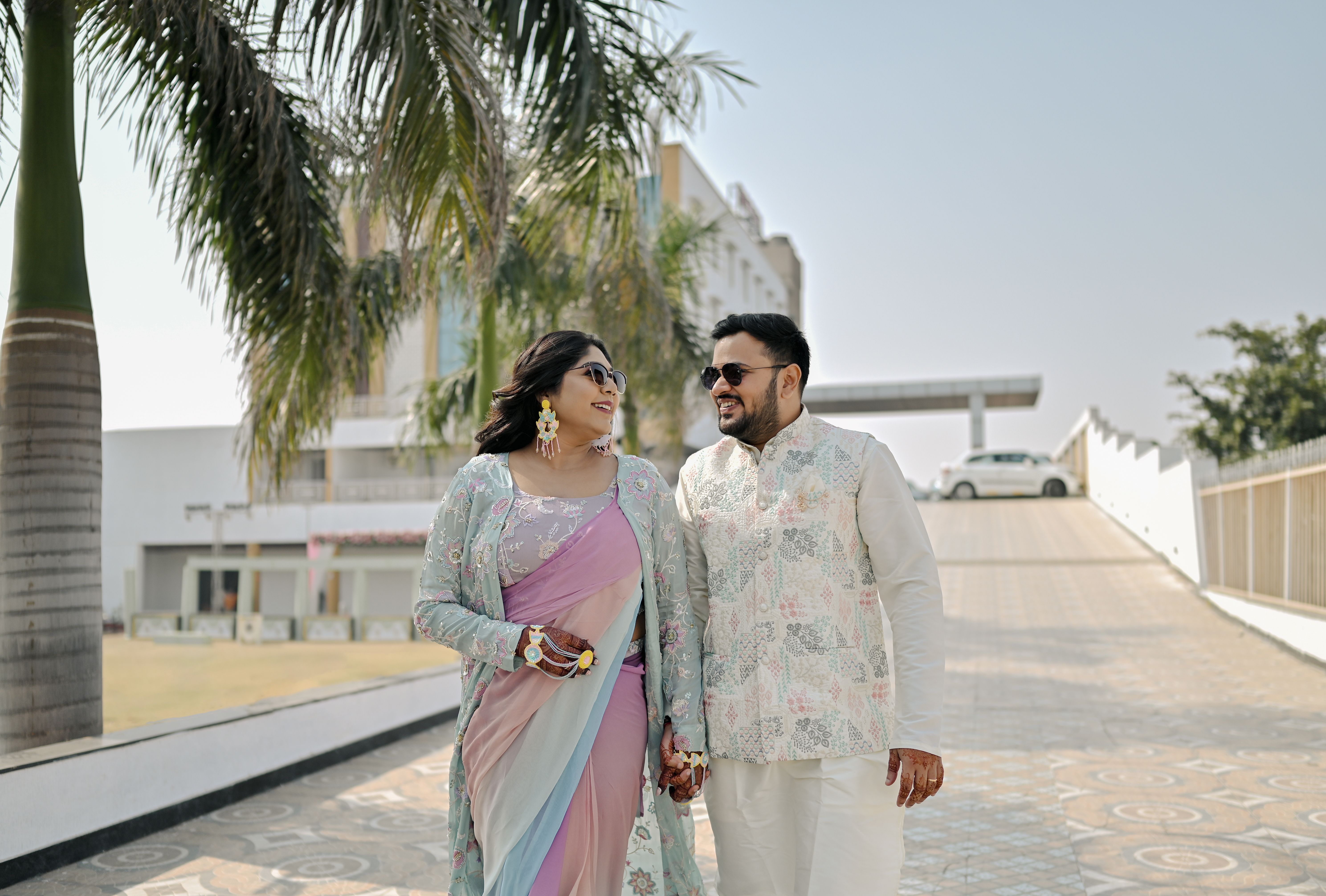 Smiling Couple in Traditional Indian Attire Outdoors · Free Stock Photo