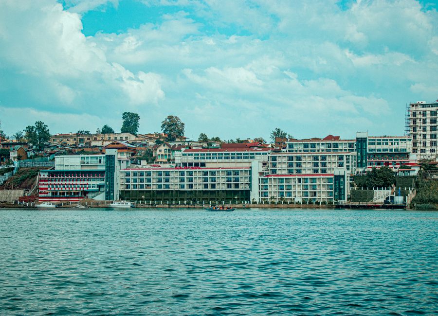 Urban landscape of Bukavu, South Kivu, Democratic Republic of Congo, featuring waterfront buildings and Lake Kivu.