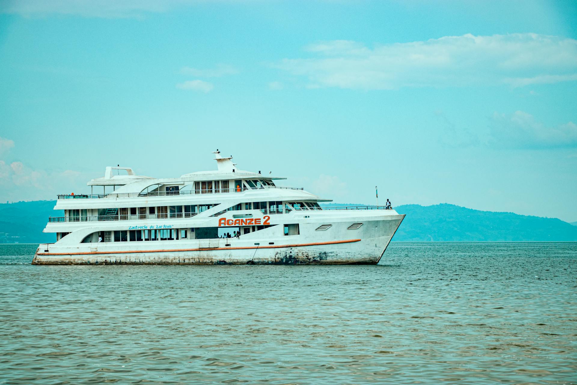 White ferry boat Aganze 2 sailing on Lake Kivu, Sud-Kivu, Congo.