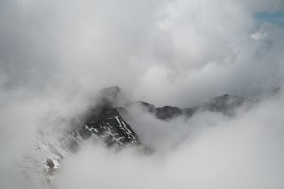 Pale fog rolling across a ridgeline — photo by Alina Chernii on Pexels