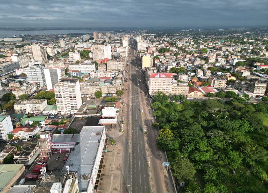 Panoramic aerial view of Maputo cityscape, showcasing urban architecture and greenery in Mozambique.