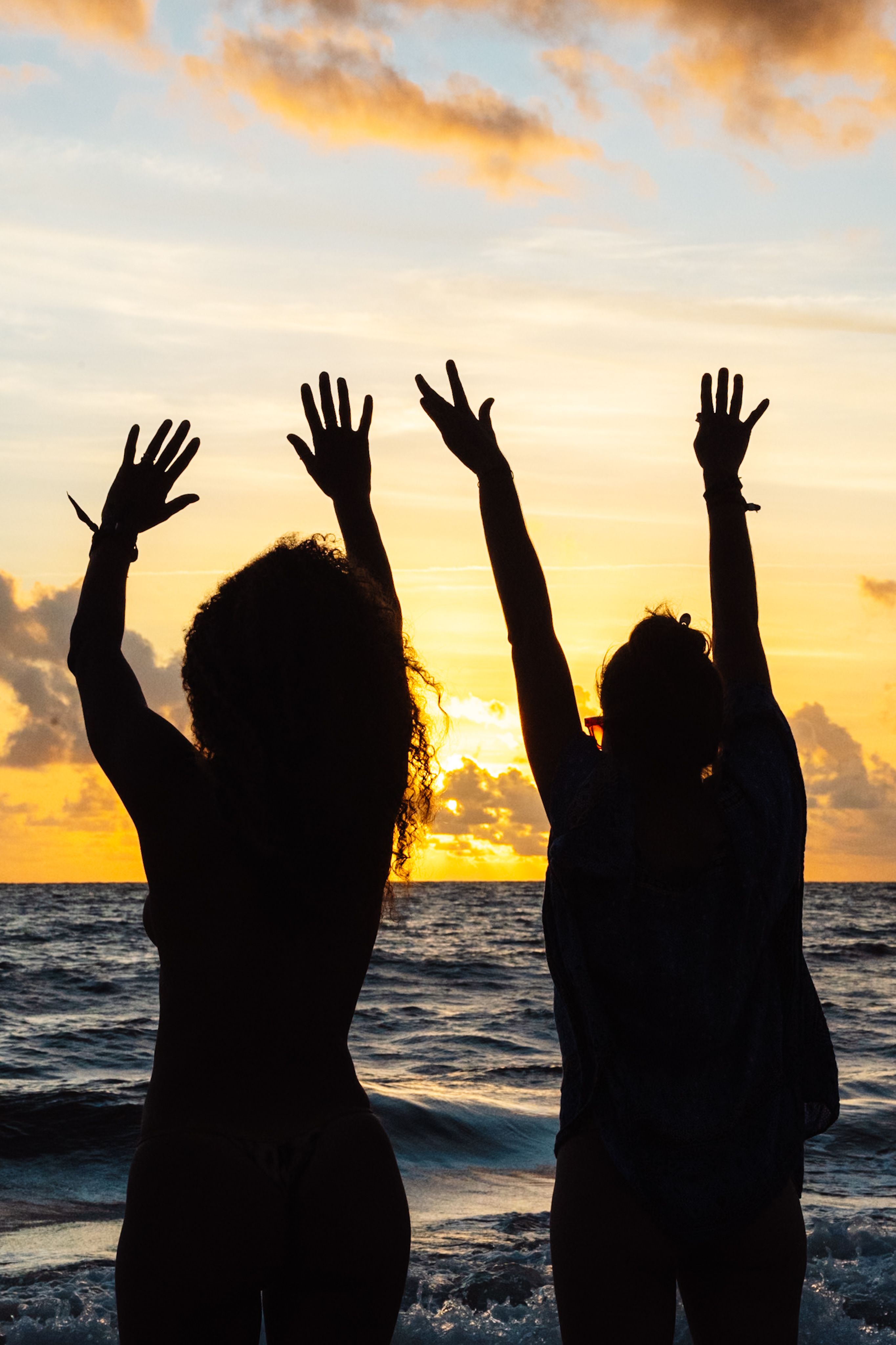 Silhouette of Joyful Women at Sunset Beach · Free Stock Photo