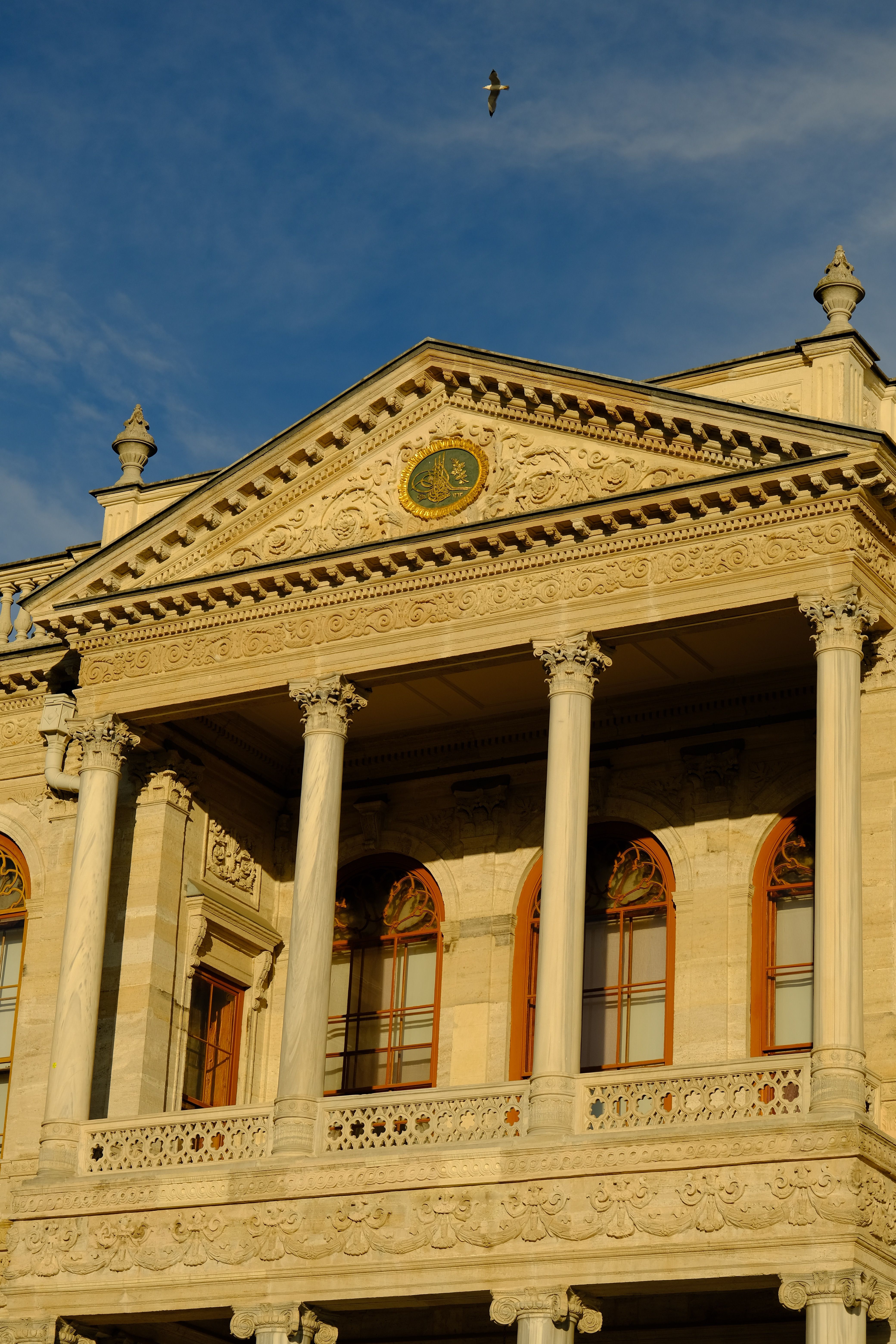 Historic Ornate Building Facade with Columns · Free Stock Photo