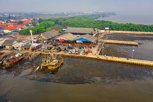 A vibrant aerial view of a bustling coastal market in Banten, Indonesia.