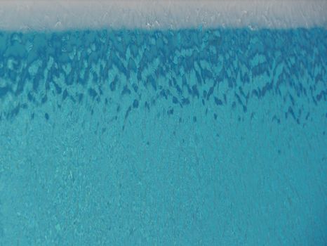 Captivating abstract texture of blue water ripples, perfect for creative projects.