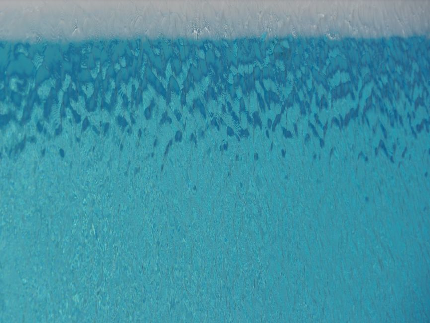 Captivating abstract texture of blue water ripples, perfect for creative projects.
