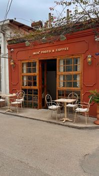 Cozy outdoor cafe with vintage decor and inviting ambiance.