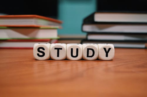 Free Gray Study Dice on Table Stock Photo