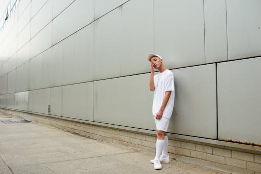Contemporary minimalist streetwear fashion shot in urban New York setting.