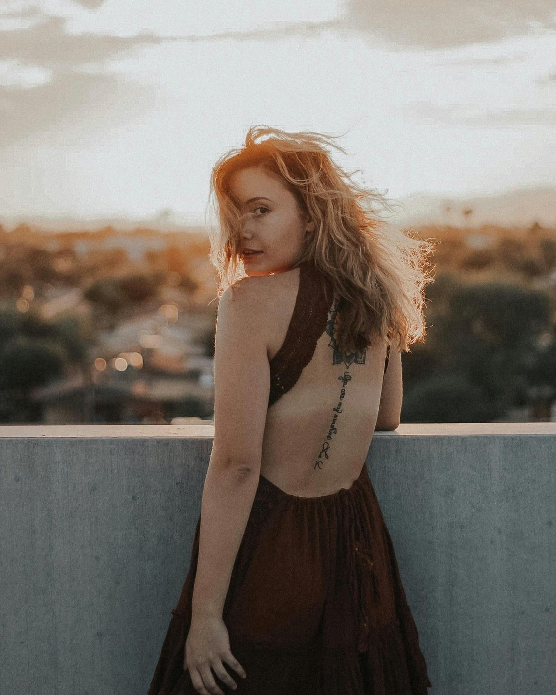 back view photo of woman looking over her left shoulder free stock photo https www pexels com photo back view photo of woman looking over her left shoulder 3019348