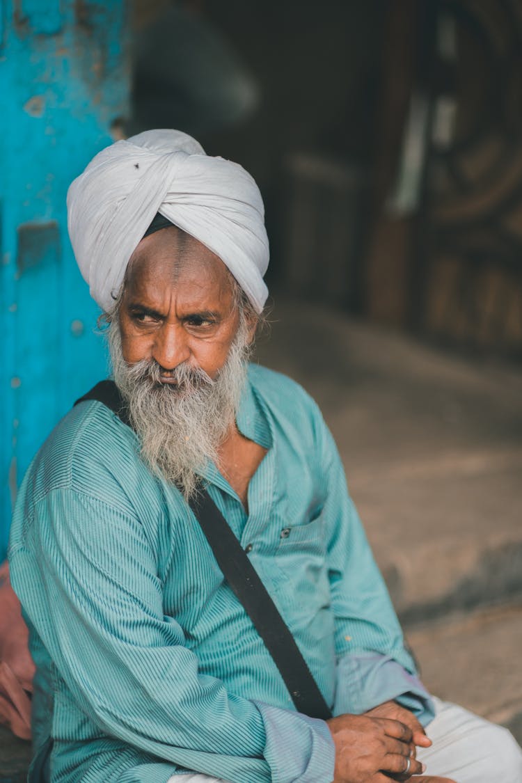 Photo Of Old Man Wearing Traditional Headwear