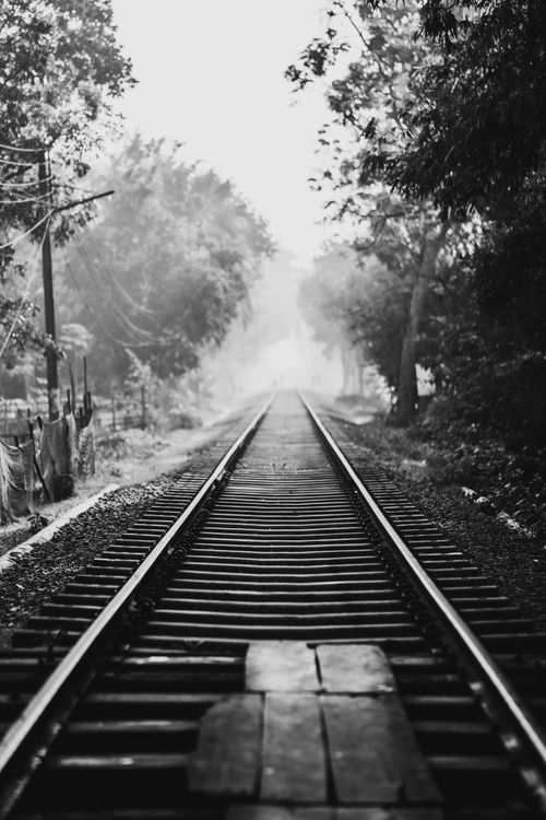 Free A striking black and white image highlighting a railway track in Faridpur, Bangladesh. Stock Photo
