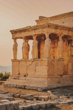 The Erechtheion temple at Acropolis, Athens, with beautiful sunset lighting.