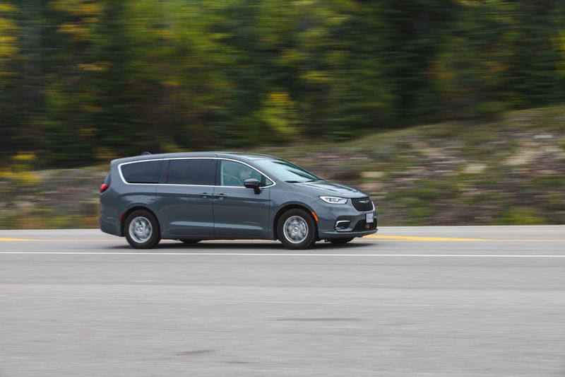 Passenger van travelling along a mountain highway