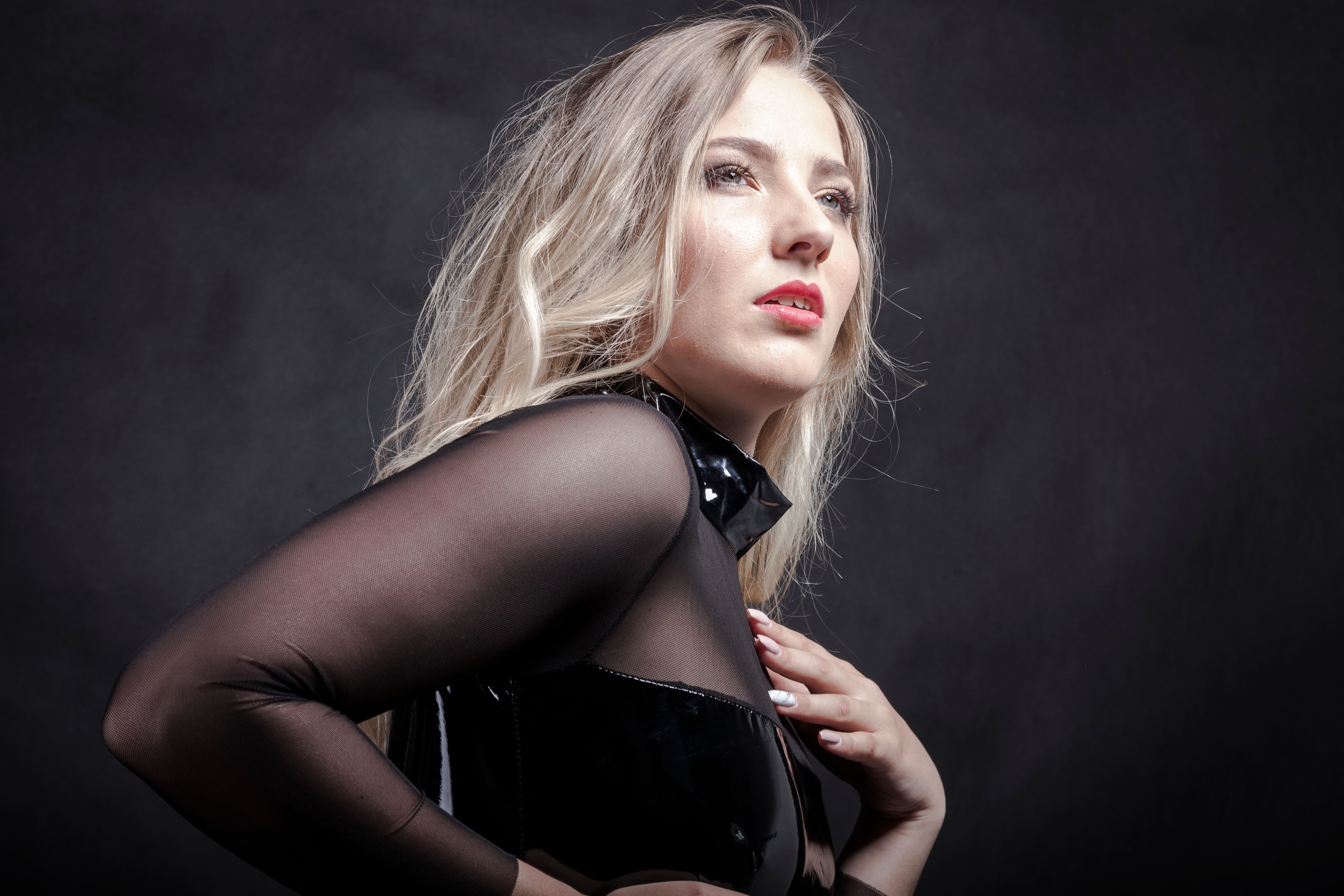 Fashion Portrait of Woman in Black Sheer Outfit · Free Stock Photo