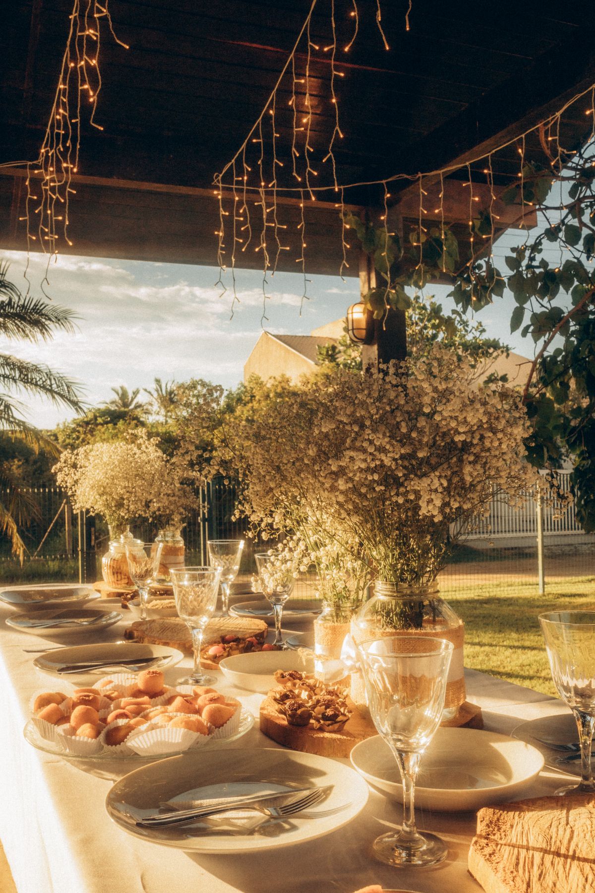 Eclipse pendant glowing over outdoor table