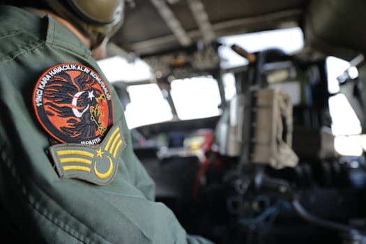 Detailed view of a military helicopter cockpit featuring a uniform patch in Adıyaman, Türkiye.