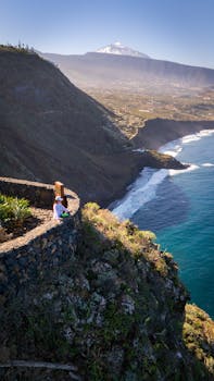A breathtaking view of Mount Teide from a cliffside in Tenerife, Canary Islands.