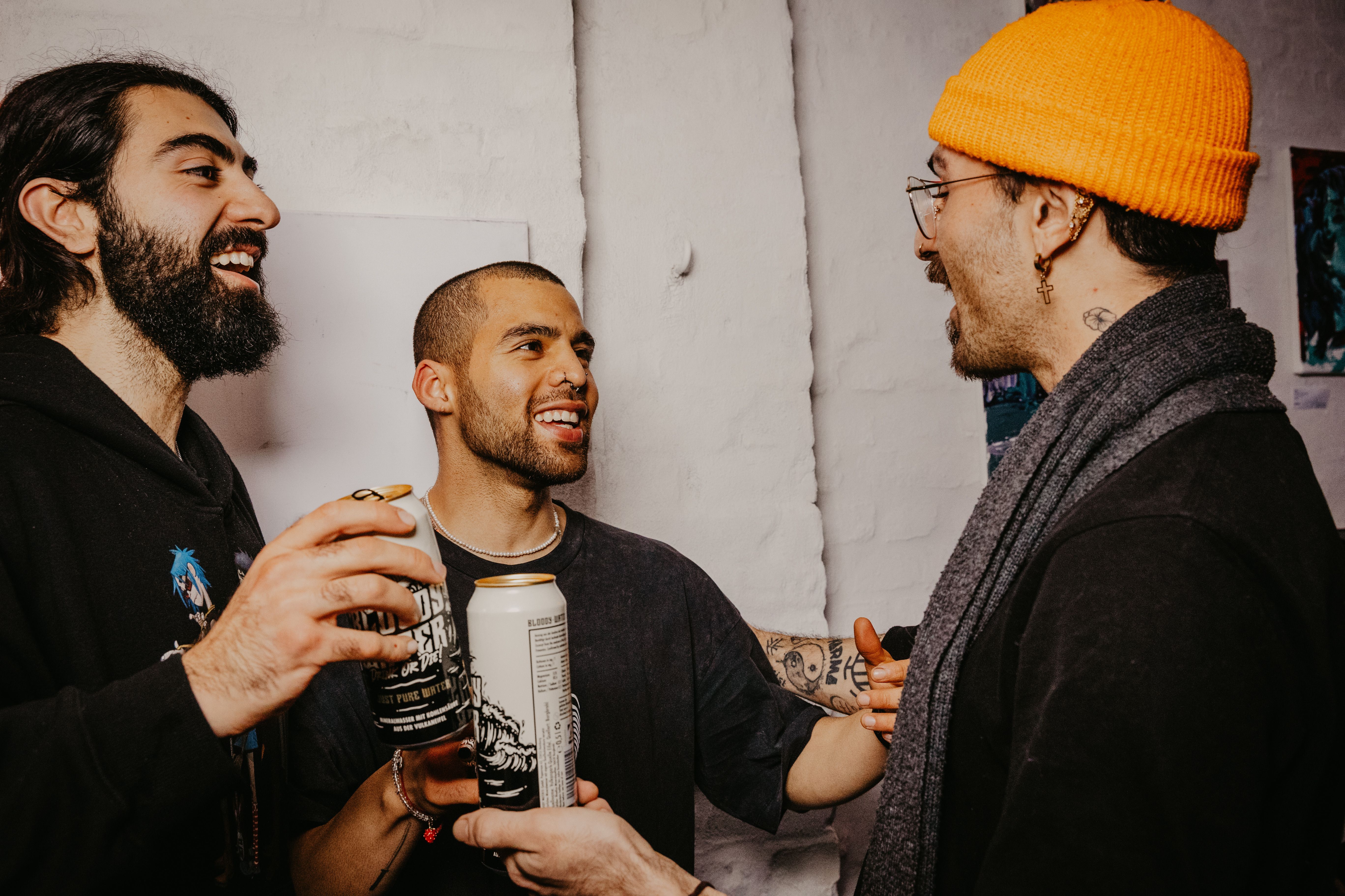 Casual Indoor Gathering with Friends Laughing · Free Stock Photo