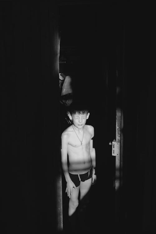 Free Grayscale Photo Of Boy Wearing Boxer Shorts Stock Photo