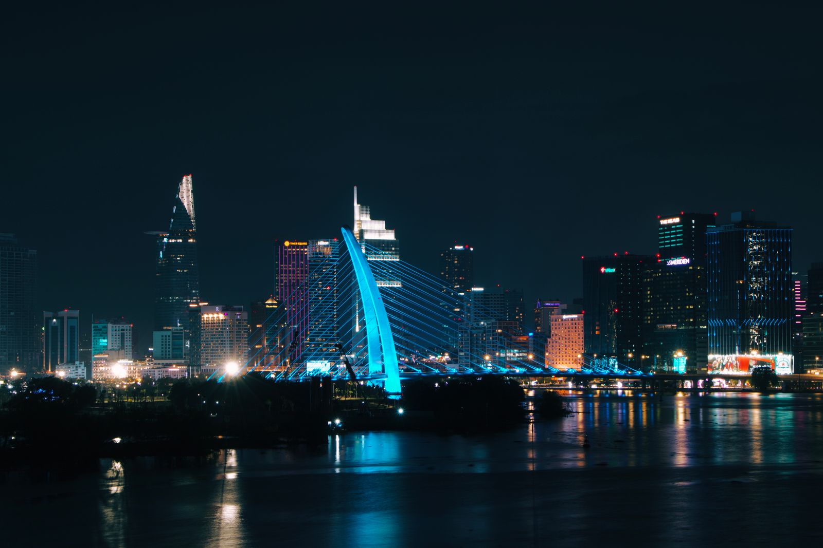 Ba Son Bridge and the Ho Chi Minh City skyline lit up at night