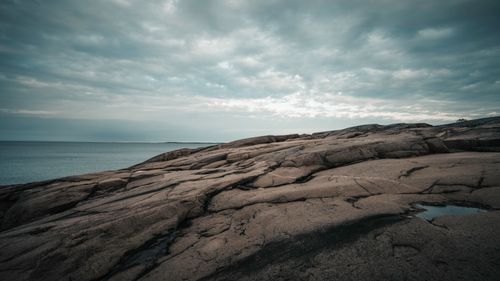 Free Serene rocky coastline with overcast skies on the Åland Islands, a natural wonder. Stock Photo
