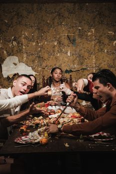An intense moment captured at a vibrant and lively dining table, showcasing diverse expressions.