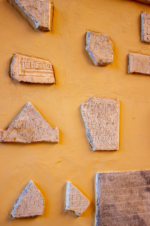Ancient Rome Inscription Ancient Roman Inscriptions on Yellow Wall · Free Stock Photo