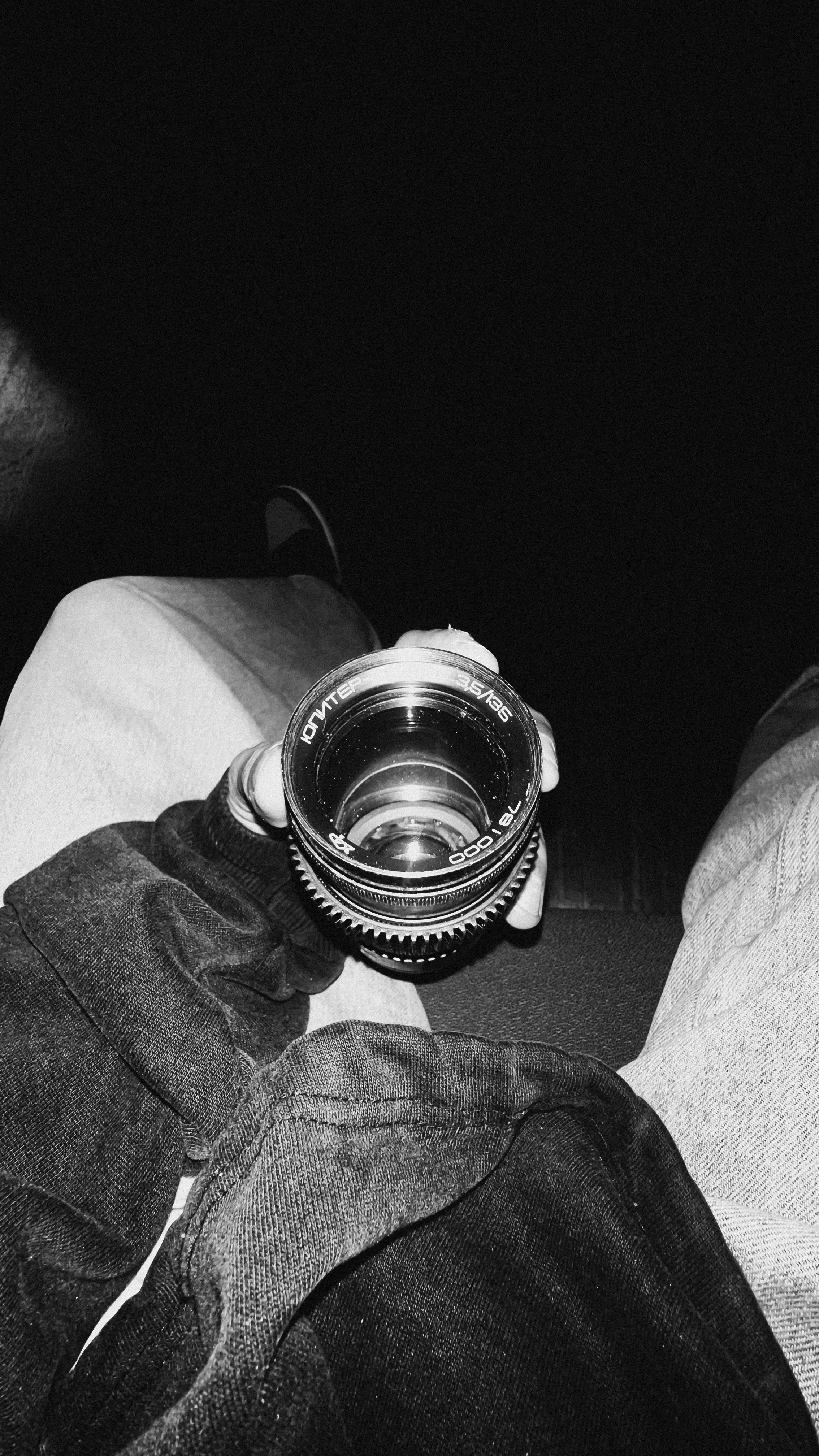 A black and white photo showing a unique perspective through a camera lens.
