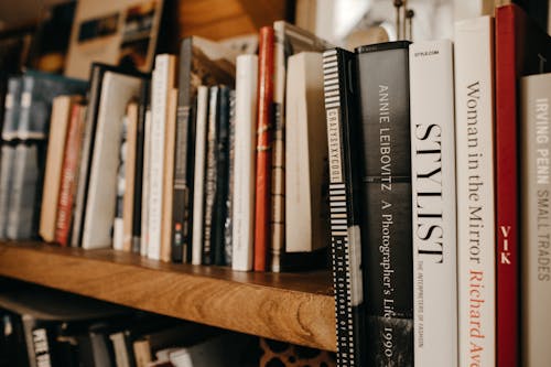 Close-Up Photo Of Books On Shelf