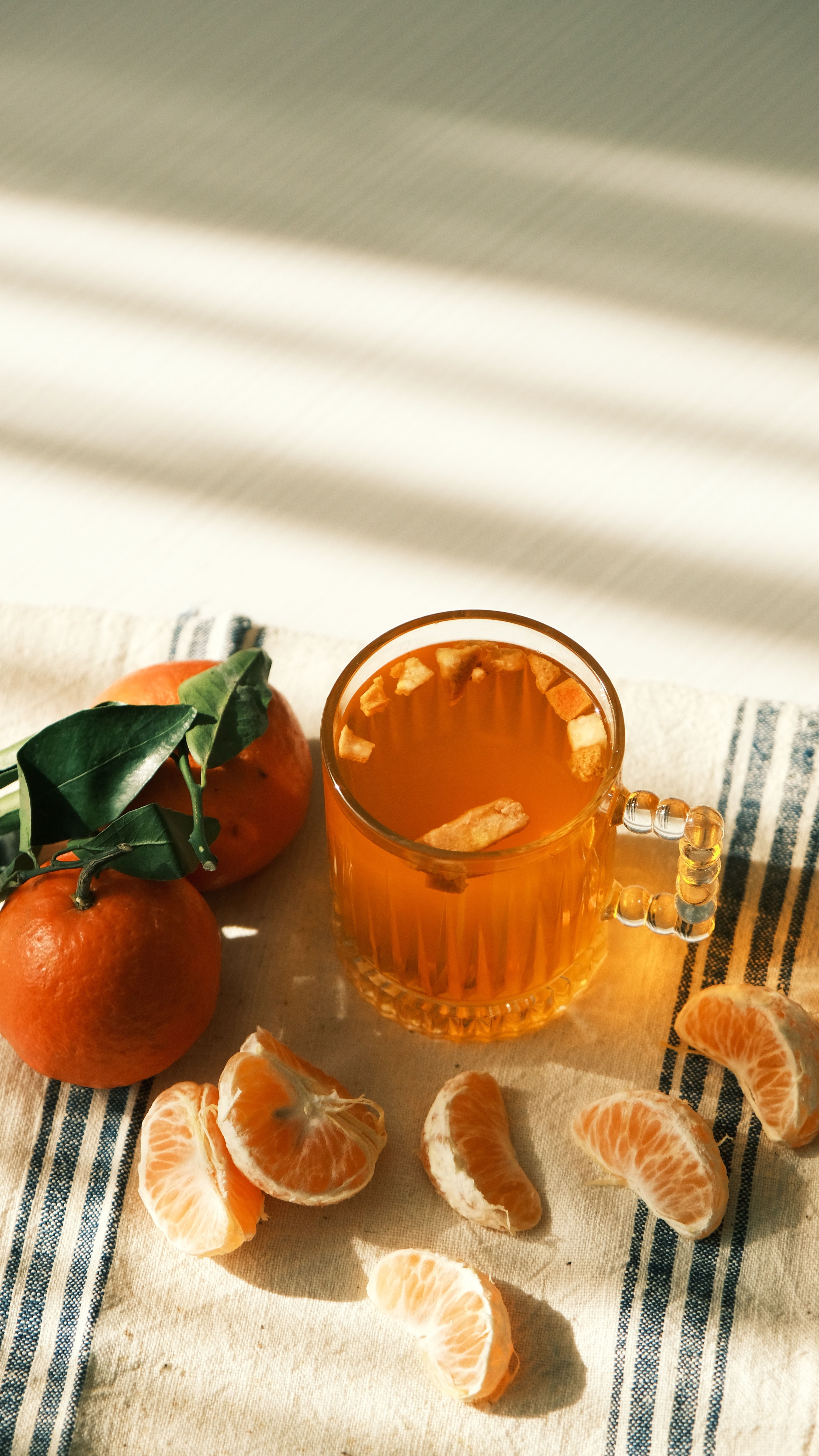 Refreshing Citrus Tea with Sunlit Tangerines · Free Stock Photo