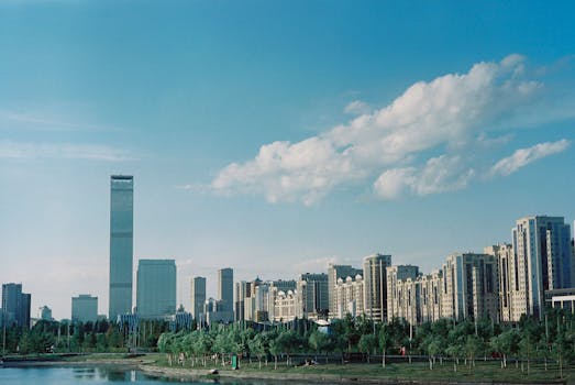 Captivating view of Astana's modern skyline under a clear blue sky, reflecting urban growth.