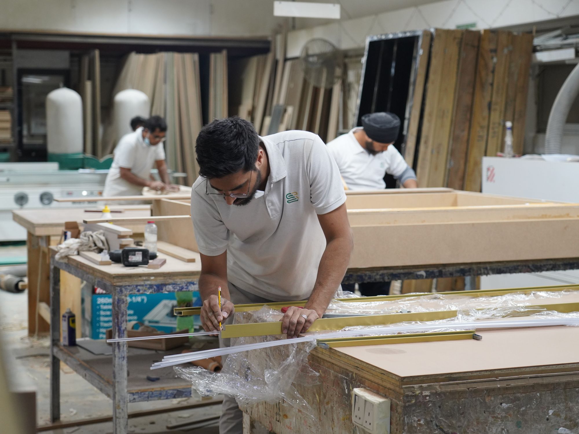 Packing Services in Brotton, North East — professional packer wrapping fragile items in a box