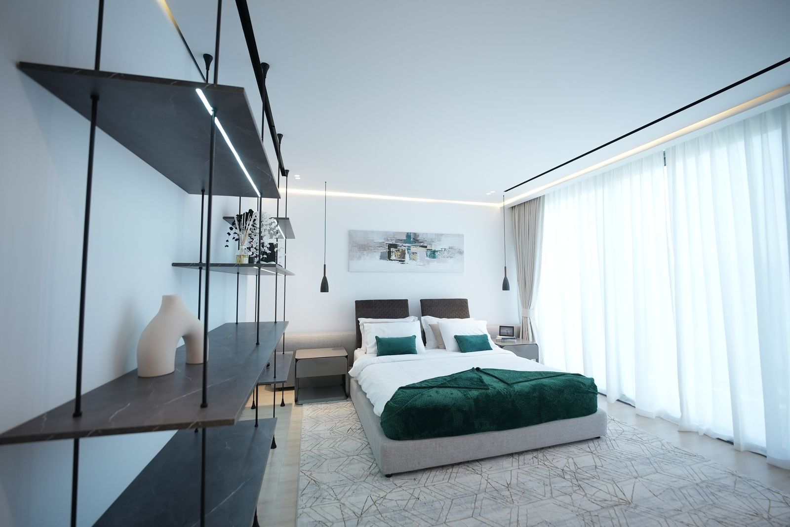 Bedroom with sheer curtains and decorative side drapes showing a layered setup
