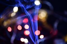 Coloured bokeh lights drifting in the dark, photo by Aurelijus U. on Pexels