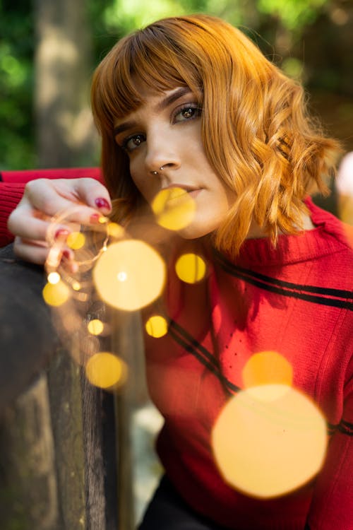 Free Photo Of Woman Holding String Lights Stock Photo