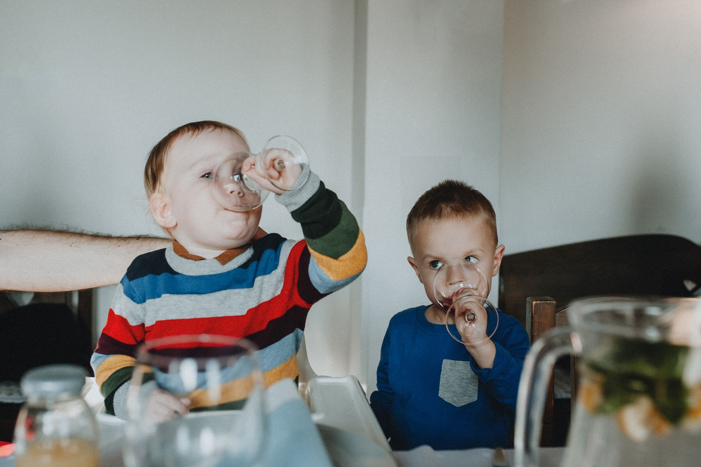 Lmitating Kids Imitating Wine Tasting at Family Meal · Free Stock Photo