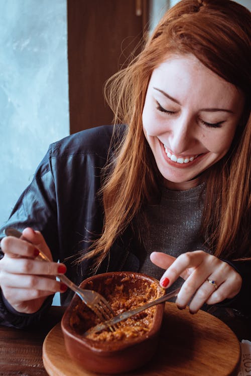 Free Photo Of Woman Eating Food Stock Photo