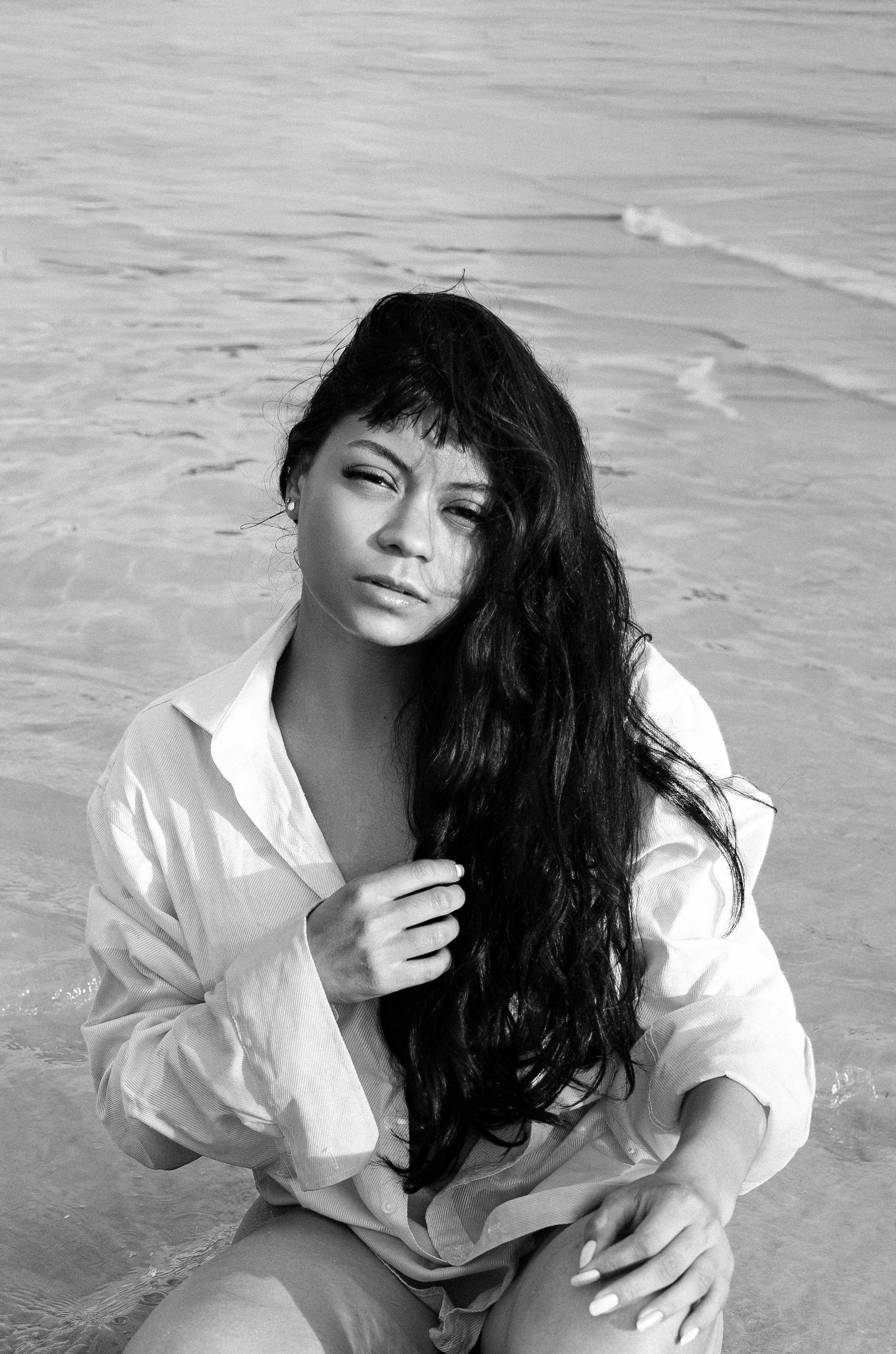 Black and White Portrait of Woman on Beach · Free Stock Photo