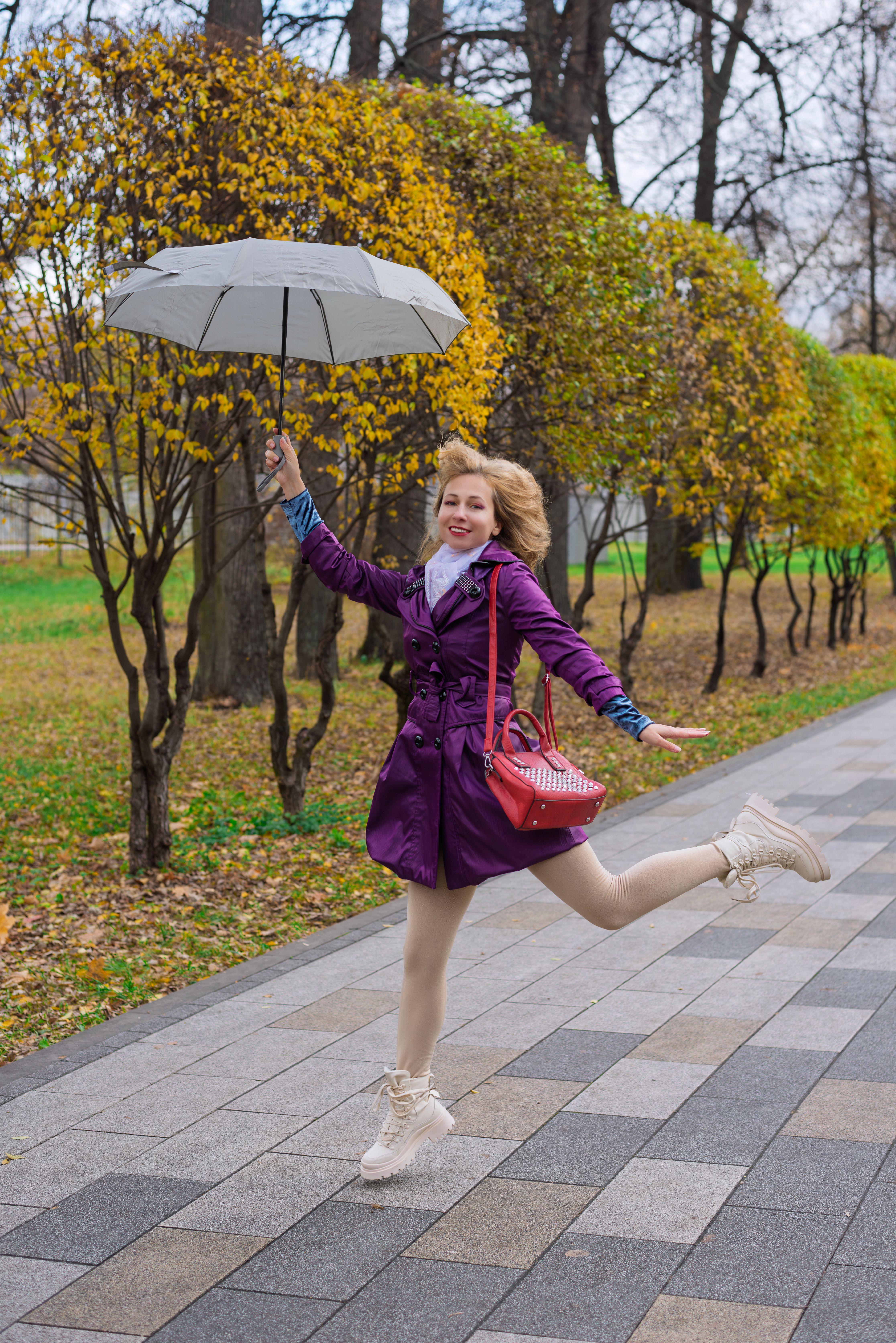Joyful Woman with Umbrella in Autumn Park · Free Stock Photo