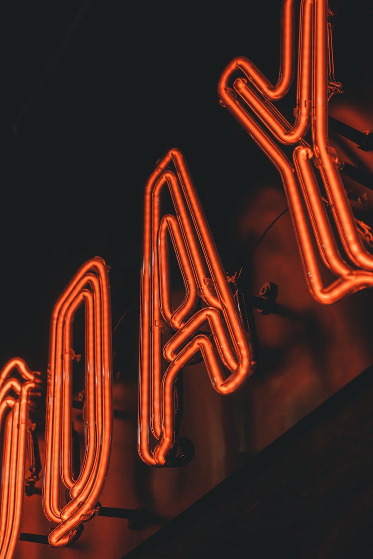 Neon Sign On Building At Night