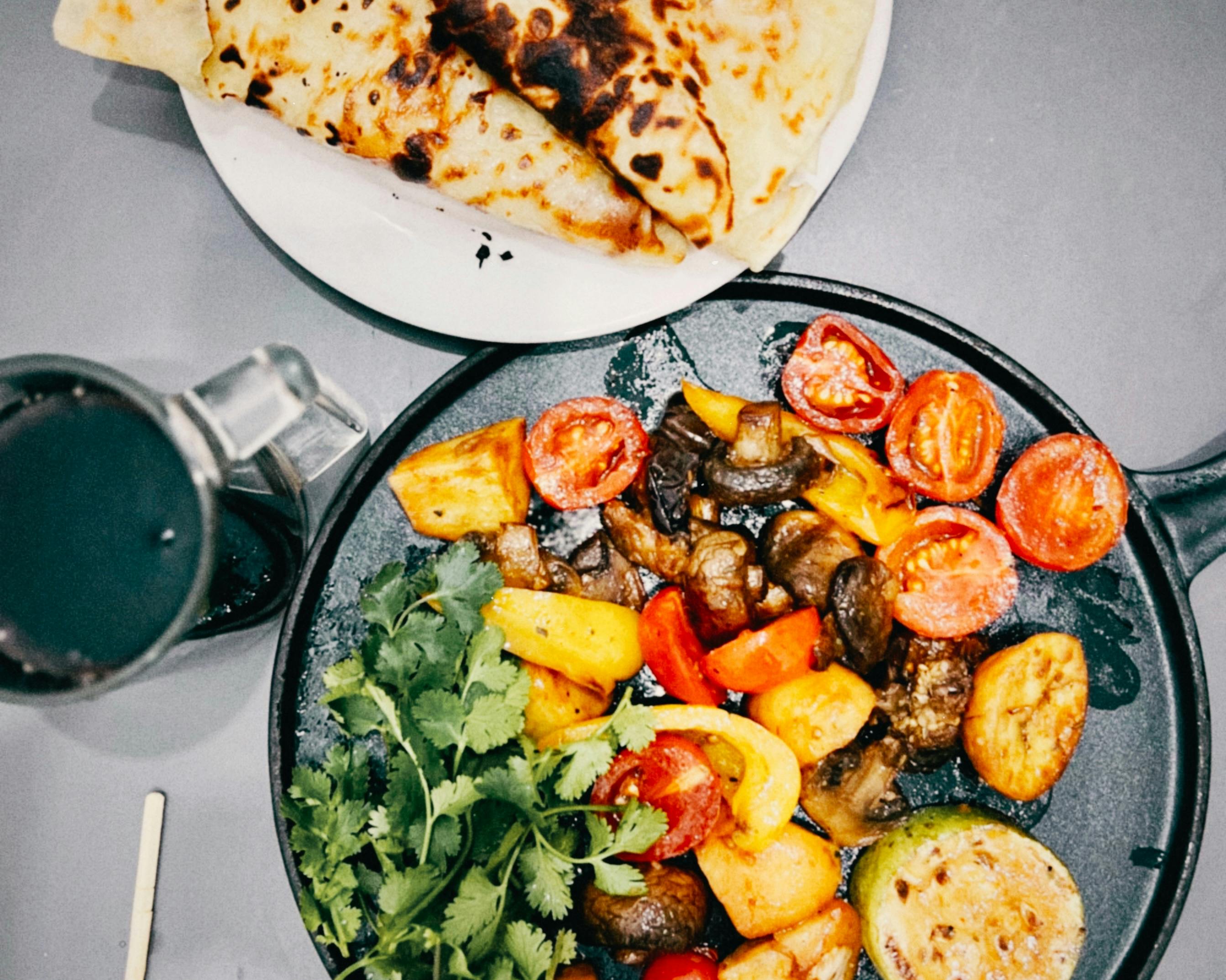 Cooking at Home vs. Dining Out: What's Better? — Photo by Aibek Skakov on Pexels