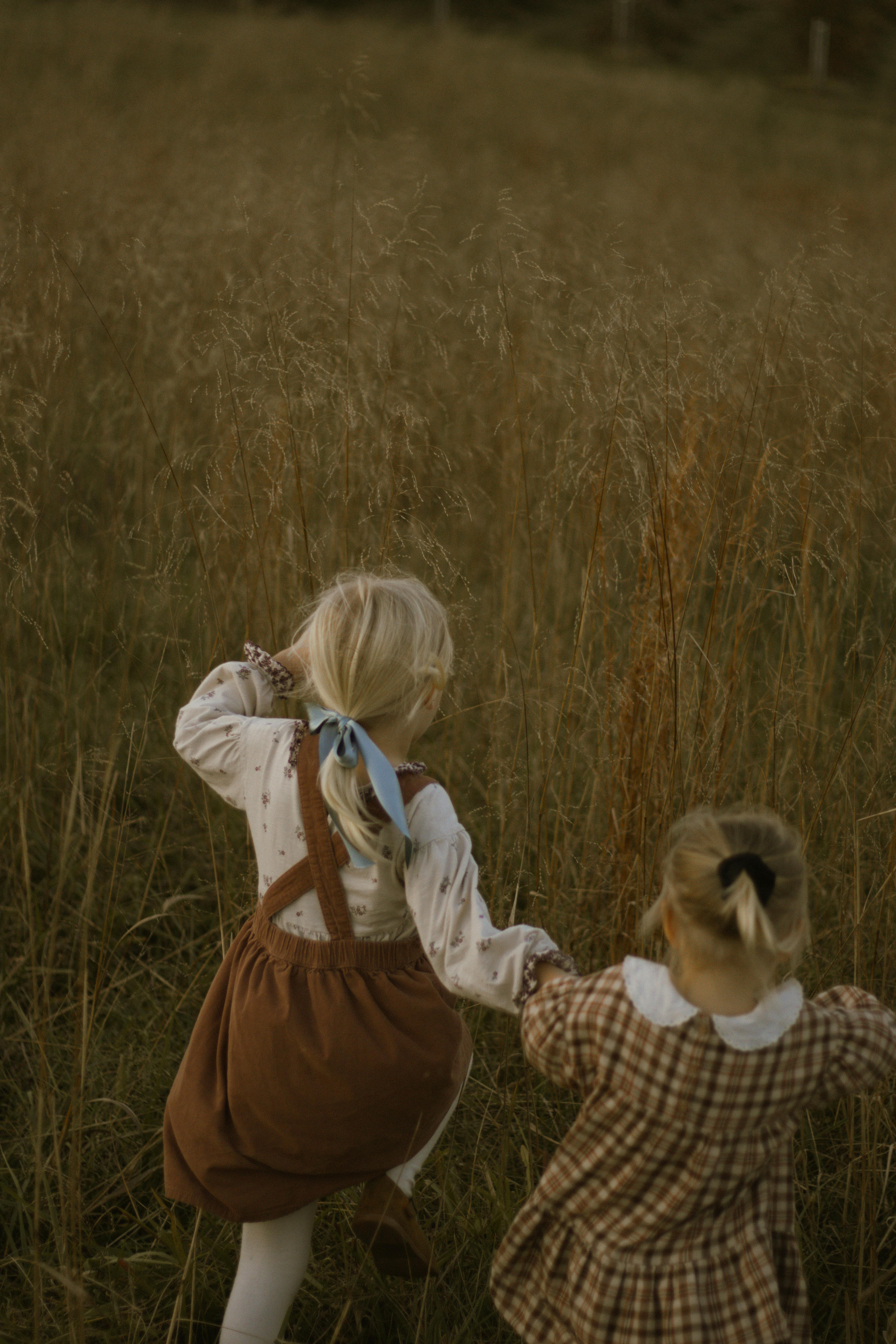 children enjoying outdoor nature walk in autumn