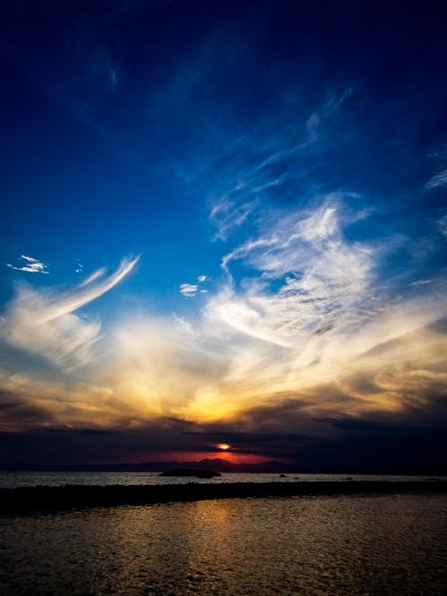 Free stock photo of clouds, dusk, sea Stock Photo