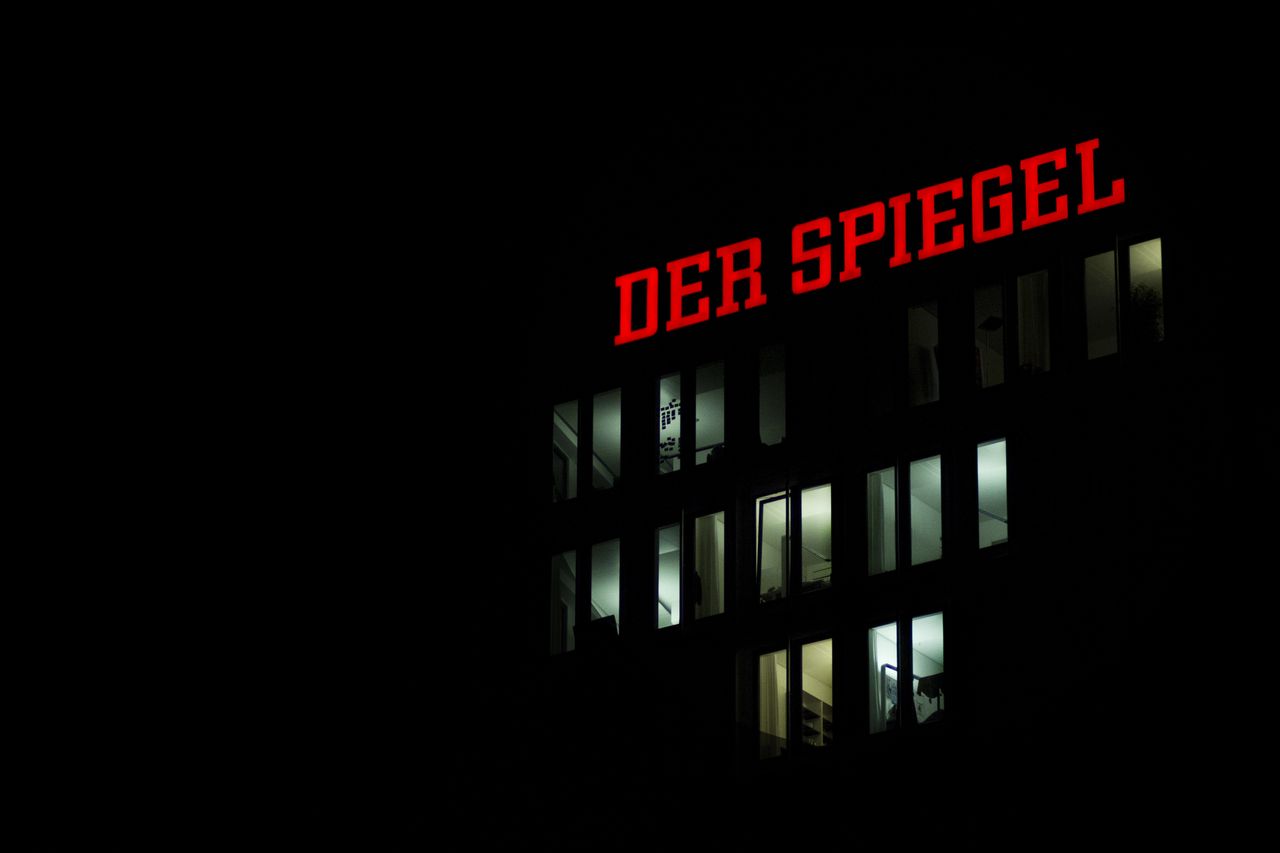 der spiegel building facade illuminated at night in hamburg germany