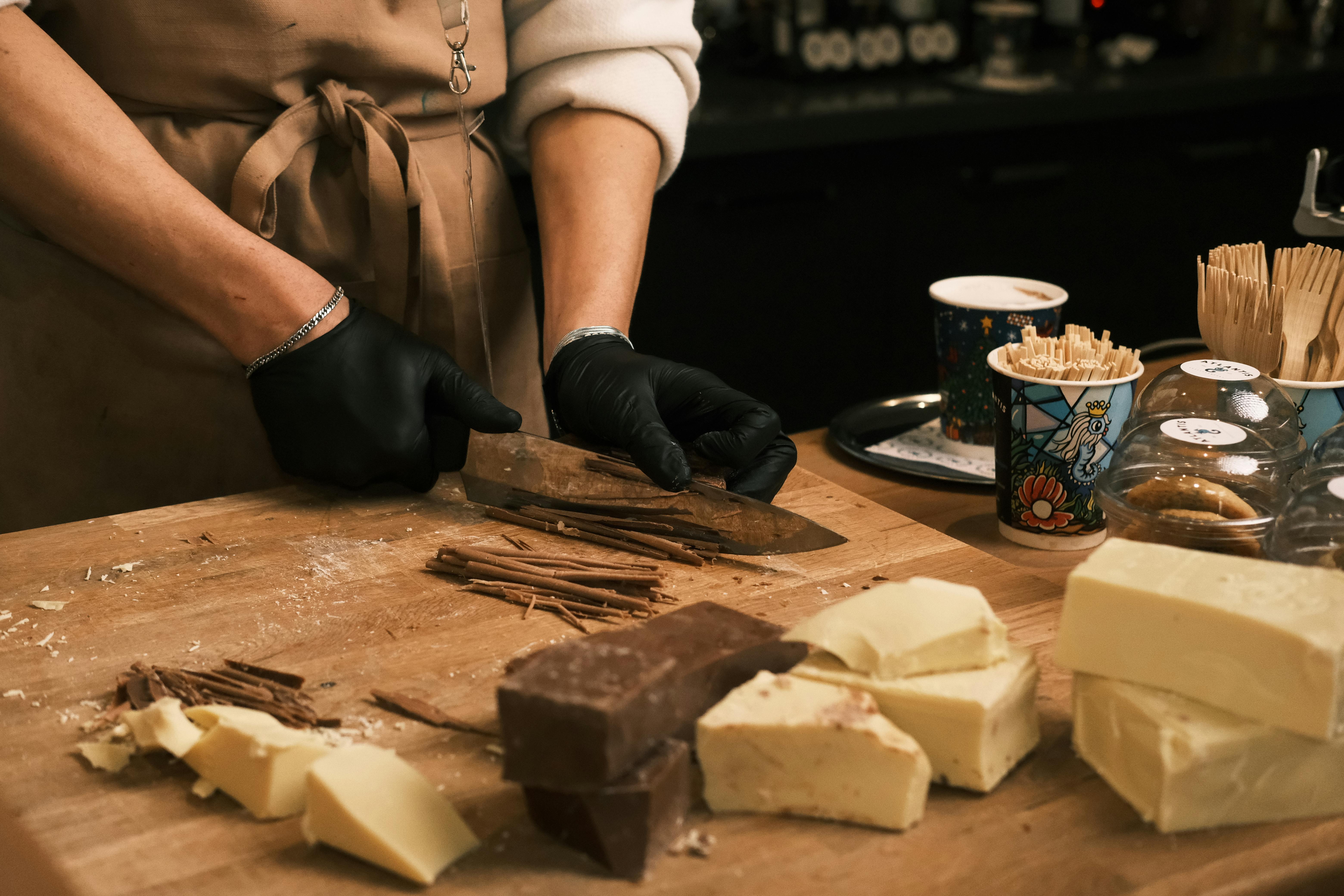 Artist crafting handmade chocolate with ingredients