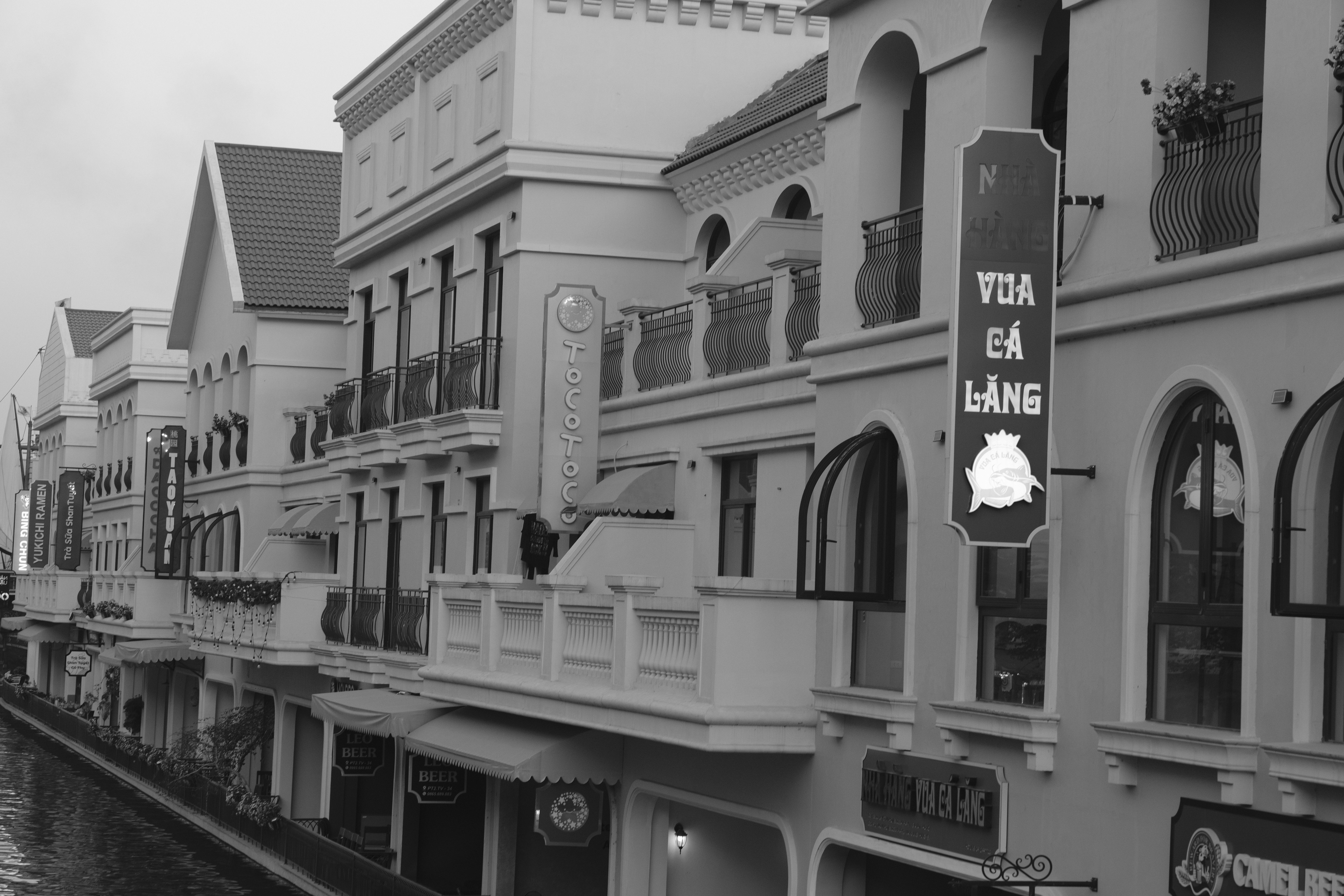 European style architecture with shops on a cozy street, capturing a vintage mood.
