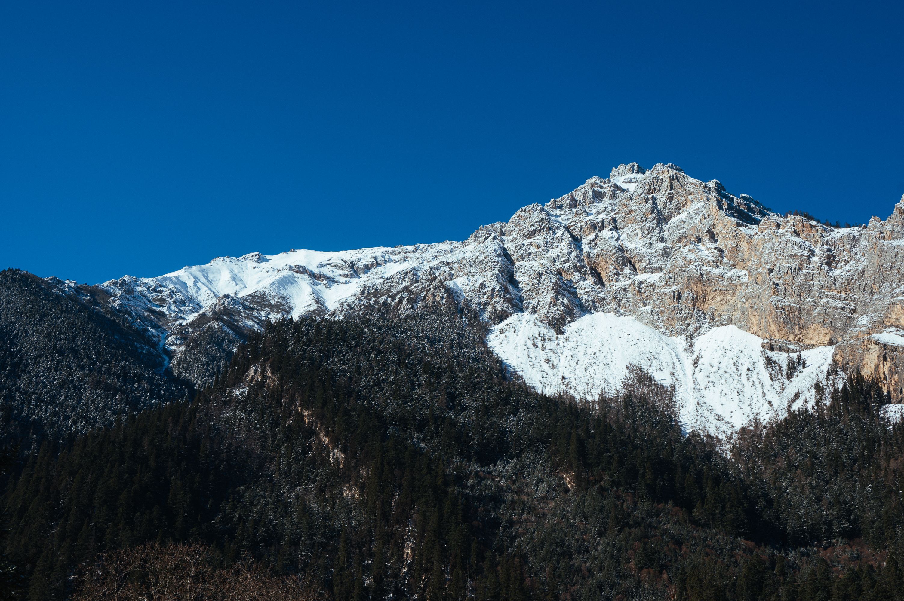 Snow-capped mountains under clear blue sky · Free Stock Photo