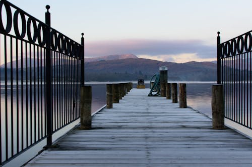 Gray Wooden Boat Dock on Body of Water