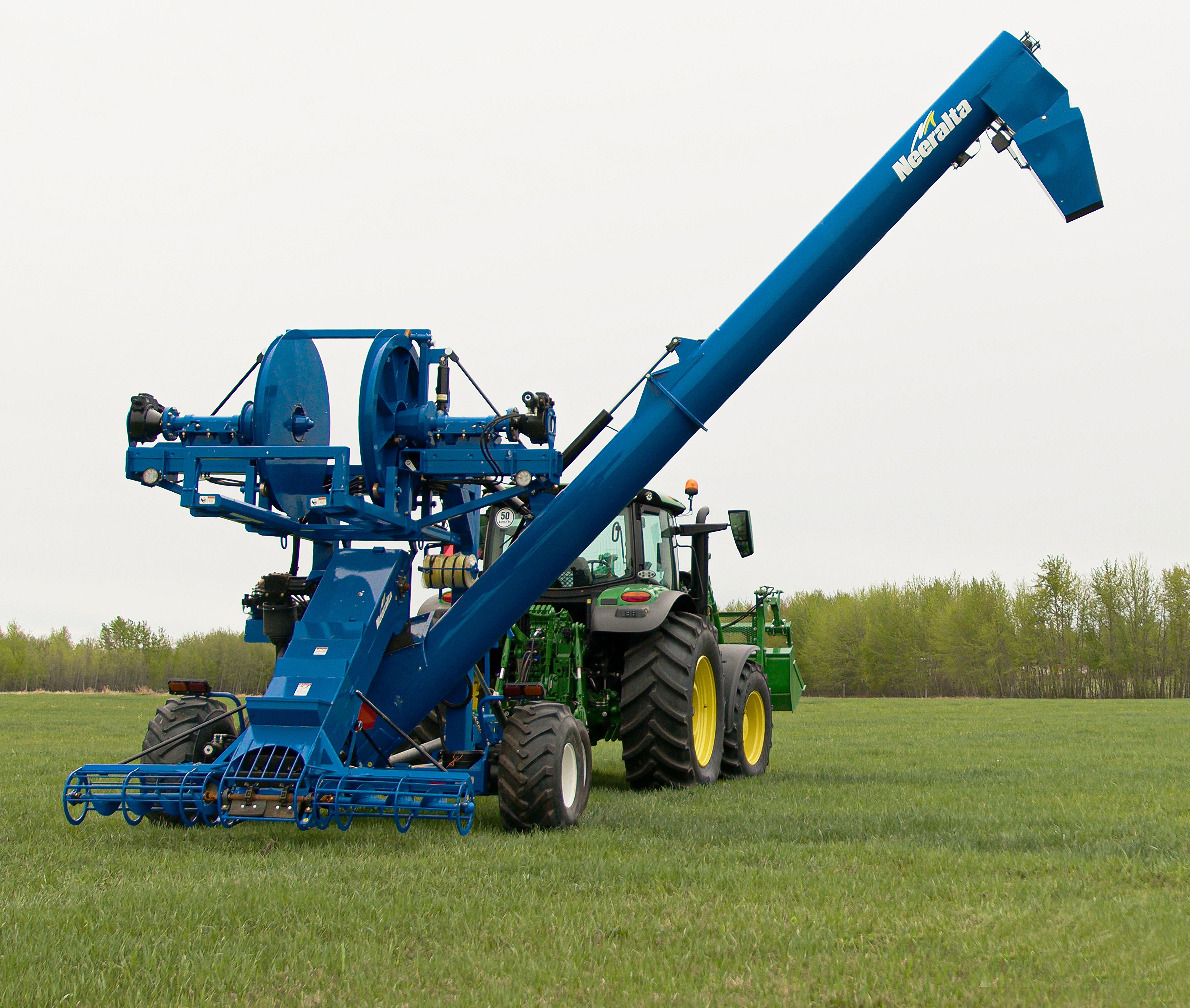 Modern Agricultural Equipment in Green Field · Free Stock Photo